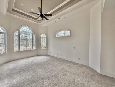 This spacious traditional home has volume ceilings throughout on Heron Point Golf Club in South Carolina - for sale on GolfHomes.com, golf home, golf lot