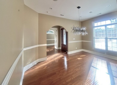 This spacious traditional home has volume ceilings throughout on Heron Point Golf Club in South Carolina - for sale on GolfHomes.com, golf home, golf lot