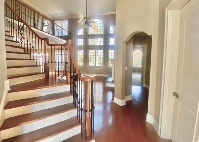 This spacious traditional home has volume ceilings throughout on Heron Point Golf Club in South Carolina - for sale on GolfHomes.com, golf home, golf lot