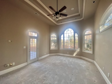 This spacious traditional home has volume ceilings throughout on Heron Point Golf Club in South Carolina - for sale on GolfHomes.com, golf home, golf lot