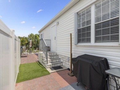 Built in 2017, this gorgeous 3/2 residence features beautiful on Barefoot Bay Golf Course in Florida - for sale on GolfHomes.com, golf home, golf lot