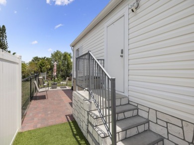 Built in 2017, this gorgeous 3/2 residence features beautiful on Barefoot Bay Golf Course in Florida - for sale on GolfHomes.com, golf home, golf lot