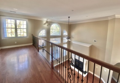 This spacious traditional home has volume ceilings throughout on Heron Point Golf Club in South Carolina - for sale on GolfHomes.com, golf home, golf lot