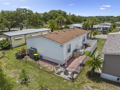 Built in 2017, this gorgeous 3/2 residence features beautiful on Barefoot Bay Golf Course in Florida - for sale on GolfHomes.com, golf home, golf lot
