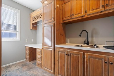 ABSOLUTELY STUNNING IN FALCON RIDGE!!! PRIMETIME LOCATION ON THE on Falcon Ridge Golf Course in Kansas - for sale on GolfHomes.com, golf home, golf lot