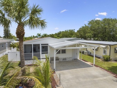 Built in 2017, this gorgeous 3/2 residence features beautiful on Barefoot Bay Golf Course in Florida - for sale on GolfHomes.com, golf home, golf lot