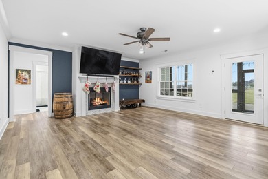 Experience refined luxury in this custom-built home in the on The Bull At Boones Trace in Kentucky - for sale on GolfHomes.com, golf home, golf lot