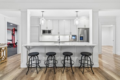 Experience refined luxury in this custom-built home in the on The Bull At Boones Trace in Kentucky - for sale on GolfHomes.com, golf home, golf lot