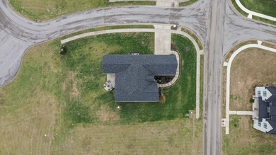 Experience refined luxury in this custom-built home in the on The Bull At Boones Trace in Kentucky - for sale on GolfHomes.com, golf home, golf lot