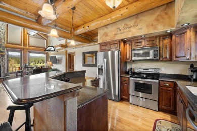 Listed by Austin Stiles, KWBH, . Dreaming of a luxury log cabin on Boulder Canyon Country Club in South Dakota - for sale on GolfHomes.com, golf home, golf lot