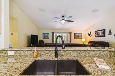 Welcome to this CUSTOM-BUILT, SECOND-OWNER, CONCRETE BLOCK HOME on Rainbow Springs Golf and Country Club in Florida - for sale on GolfHomes.com, golf home, golf lot