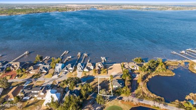 A rare opportunity awaits in Panama Country Club - the ONLY on Panama Country Club in Florida - for sale on GolfHomes.com, golf home, golf lot