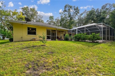 Welcome to this CUSTOM-BUILT, SECOND-OWNER, CONCRETE BLOCK HOME on Rainbow Springs Golf and Country Club in Florida - for sale on GolfHomes.com, golf home, golf lot