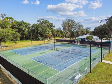 Welcome to this CUSTOM-BUILT, SECOND-OWNER, CONCRETE BLOCK HOME on Rainbow Springs Golf and Country Club in Florida - for sale on GolfHomes.com, golf home, golf lot