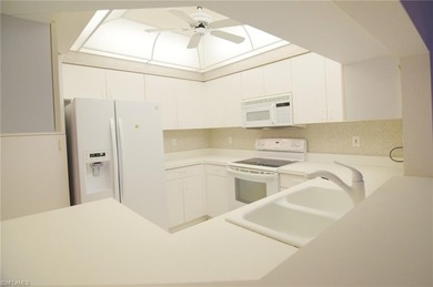 This first-floor, end-unit residence is ready to move in. It is on Vineyards Golf and Country Club in Florida - for sale on GolfHomes.com, golf home, golf lot