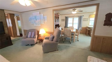 TURNKEY MOBILE HOME IN ACTIVE 55+ COMMUNITY! This one bedroom, 1 on River Run Golf Links in Florida - for sale on GolfHomes.com, golf home, golf lot