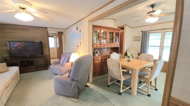 TURNKEY MOBILE HOME IN ACTIVE 55+ COMMUNITY! This one bedroom, 1 on River Run Golf Links in Florida - for sale on GolfHomes.com, golf home, golf lot