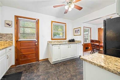 All-brick ranch on a picturesque Mayflower Park street, just two on Elizabeth Manor Golf and Country Club in Virginia - for sale on GolfHomes.com, golf home, golf lot