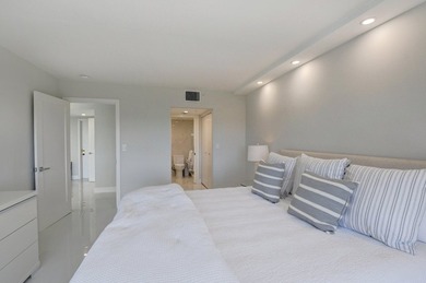 This expanded 2-bedroom, 2-bathroom Lakewood condo was renovated on Boca West Golf and Country Club in Florida - for sale on GolfHomes.com, golf home, golf lot