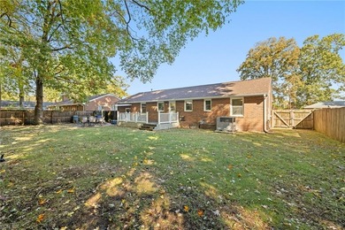 All-brick ranch on a picturesque Mayflower Park street, just two on Elizabeth Manor Golf and Country Club in Virginia - for sale on GolfHomes.com, golf home, golf lot