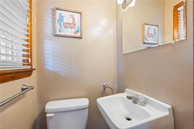 All-brick ranch on a picturesque Mayflower Park street, just two on Elizabeth Manor Golf and Country Club in Virginia - for sale on GolfHomes.com, golf home, golf lot