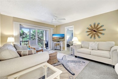 CLEAN, COASTAL AND INVITING!!!!!!! Only 10 minutes to the white on Quail Run Golf Club In Naples in Florida - for sale on GolfHomes.com, golf home, golf lot