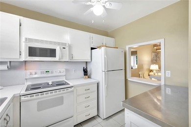 CLEAN, COASTAL AND INVITING!!!!!!! Only 10 minutes to the white on Quail Run Golf Club In Naples in Florida - for sale on GolfHomes.com, golf home, golf lot