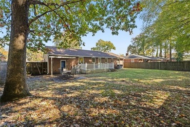 All-brick ranch on a picturesque Mayflower Park street, just two on Elizabeth Manor Golf and Country Club in Virginia - for sale on GolfHomes.com, golf home, golf lot