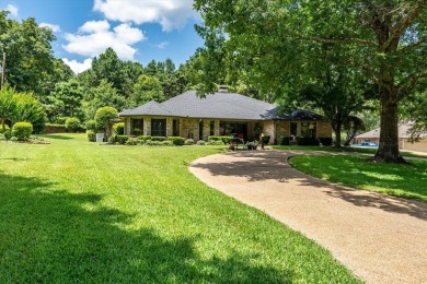Absolutely stunning brick home in highly sought-after gated on Holly Lake Ranch Golf Club in Texas - for sale on GolfHomes.com, golf home, golf lot