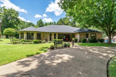 Absolutely stunning brick home in highly sought-after gated on Holly Lake Ranch Golf Club in Texas - for sale on GolfHomes.com, golf home, golf lot