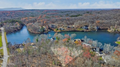 Exquisite building lot across the street from beautiful Lake on Druid Hills Golf Club in Tennessee - for sale on GolfHomes.com, golf home, golf lot