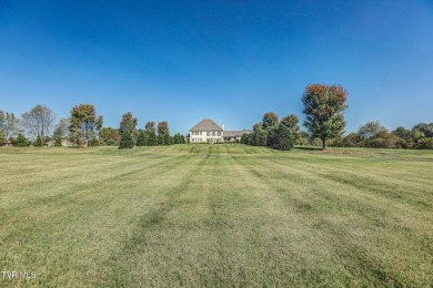 A stately brick-column entrance leads to this breathtaking on The Crossings Golf Club in Tennessee - for sale on GolfHomes.com, golf home, golf lot