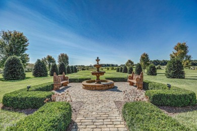 A stately brick-column entrance leads to this breathtaking on The Crossings Golf Club in Tennessee - for sale on GolfHomes.com, golf home, golf lot