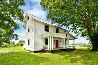 This charming countryside gem is nestled across from Colin Creek on Lake Louise Golf Club in North Carolina - for sale on GolfHomes.com, golf home, golf lot