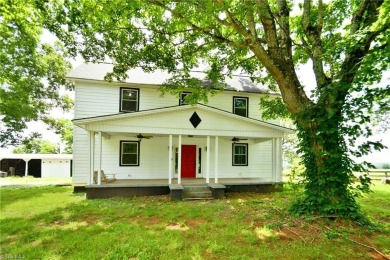 This charming countryside gem is nestled across from Colin Creek on Lake Louise Golf Club in North Carolina - for sale on GolfHomes.com, golf home, golf lot