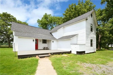 This charming countryside gem is nestled across from Colin Creek on Lake Louise Golf Club in North Carolina - for sale on GolfHomes.com, golf home, golf lot