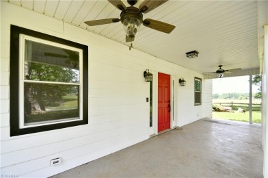 This charming countryside gem is nestled across from Colin Creek on Lake Louise Golf Club in North Carolina - for sale on GolfHomes.com, golf home, golf lot