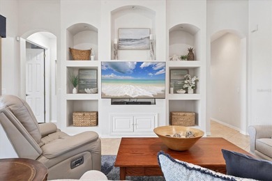 Situated on over a quarter acre of tranquil waterfront in the on Legacy Golf Club in Florida - for sale on GolfHomes.com, golf home, golf lot