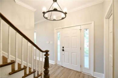 This charming countryside gem is nestled across from Colin Creek on Lake Louise Golf Club in North Carolina - for sale on GolfHomes.com, golf home, golf lot