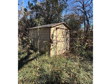 Great Investment Opportunity. Bring your decorating ideas to on De Cordova Bend Country Club in Texas - for sale on GolfHomes.com, golf home, golf lot