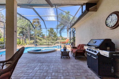 Situated on over a quarter acre of tranquil waterfront in the on Legacy Golf Club in Florida - for sale on GolfHomes.com, golf home, golf lot