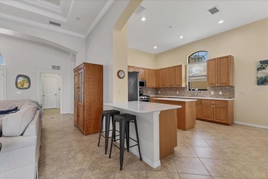 Situated on over a quarter acre of tranquil waterfront in the on Legacy Golf Club in Florida - for sale on GolfHomes.com, golf home, golf lot