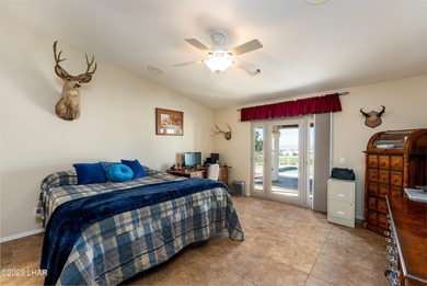 Welcome to this spacious 3-bedroom, 2-bathroom home with 1,826 on London Bridge Golf Course in Arizona - for sale on GolfHomes.com, golf home, golf lot