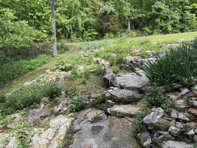 Updated 3 bedroom 1.5 bath house on about 0.6 acres, with a on Cherokee Village North Course in Arkansas - for sale on GolfHomes.com, golf home, golf lot