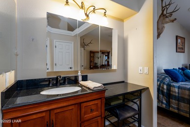 Welcome to this spacious 3-bedroom, 2-bathroom home with 1,826 on London Bridge Golf Course in Arizona - for sale on GolfHomes.com, golf home, golf lot