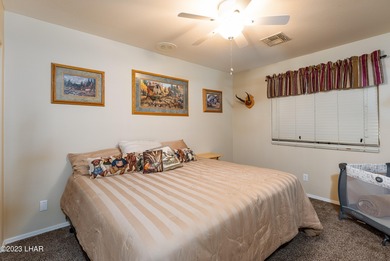 Welcome to this spacious 3-bedroom, 2-bathroom home with 1,826 on London Bridge Golf Course in Arizona - for sale on GolfHomes.com, golf home, golf lot