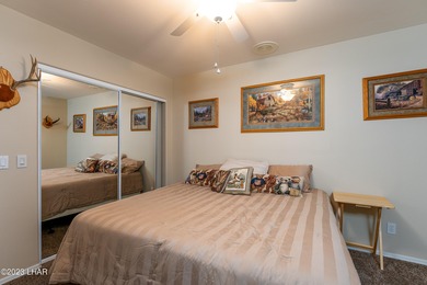 Welcome to this spacious 3-bedroom, 2-bathroom home with 1,826 on London Bridge Golf Course in Arizona - for sale on GolfHomes.com, golf home, golf lot