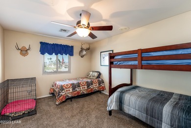 Welcome to this spacious 3-bedroom, 2-bathroom home with 1,826 on London Bridge Golf Course in Arizona - for sale on GolfHomes.com, golf home, golf lot