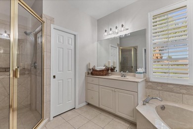 Situated on over a quarter acre of tranquil waterfront in the on Legacy Golf Club in Florida - for sale on GolfHomes.com, golf home, golf lot