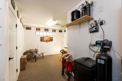 Welcome to this spacious 3-bedroom, 2-bathroom home with 1,826 on London Bridge Golf Course in Arizona - for sale on GolfHomes.com, golf home, golf lot